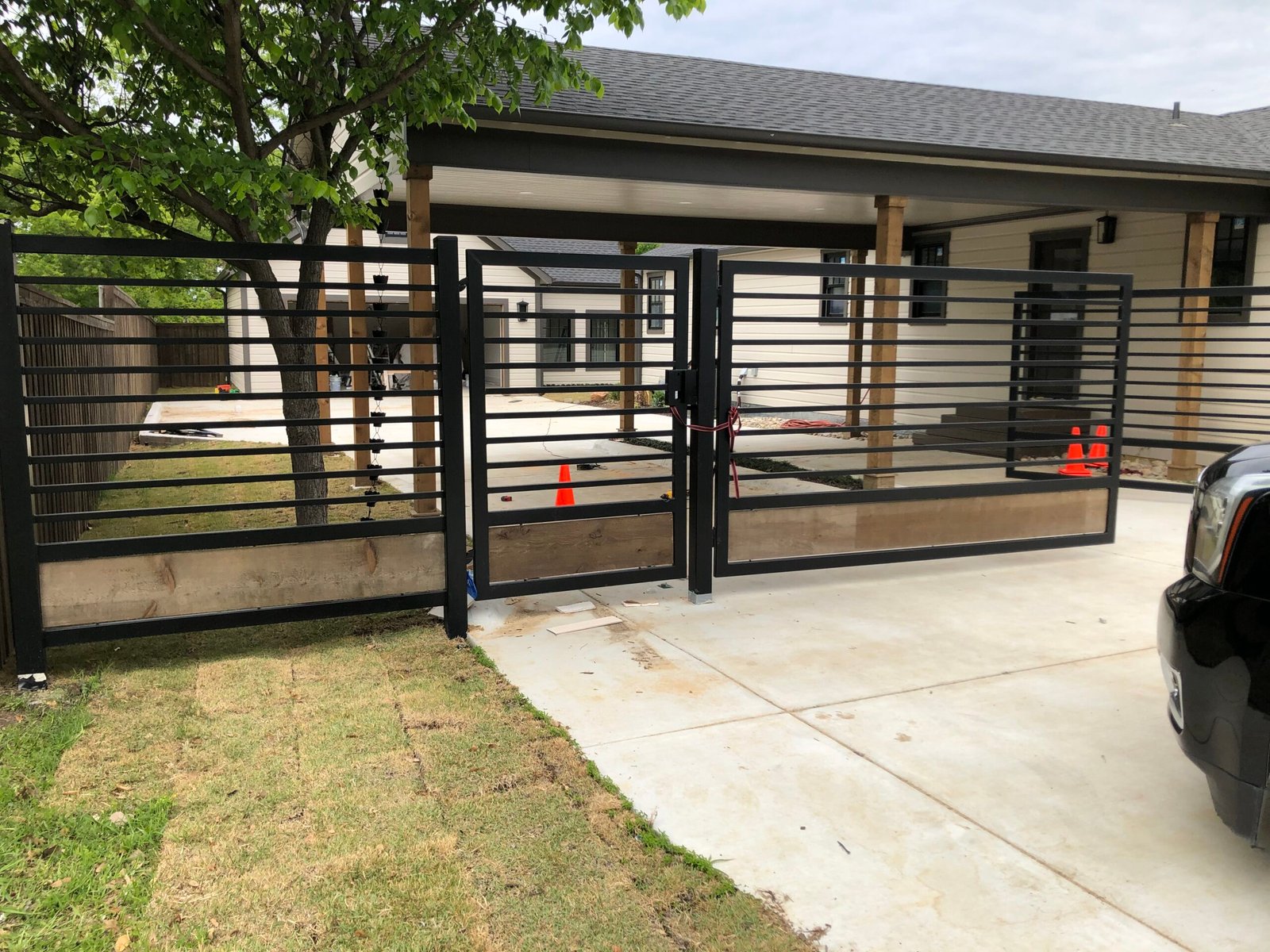 Custom driveway gates completed with a new North Texas home