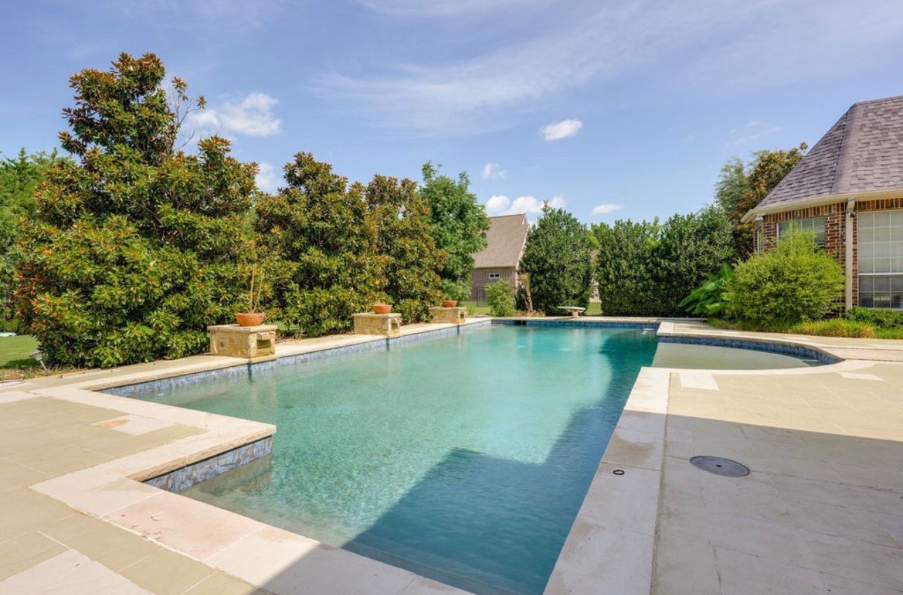 Pool area before galvanized metal fence installation in Parker Texas
