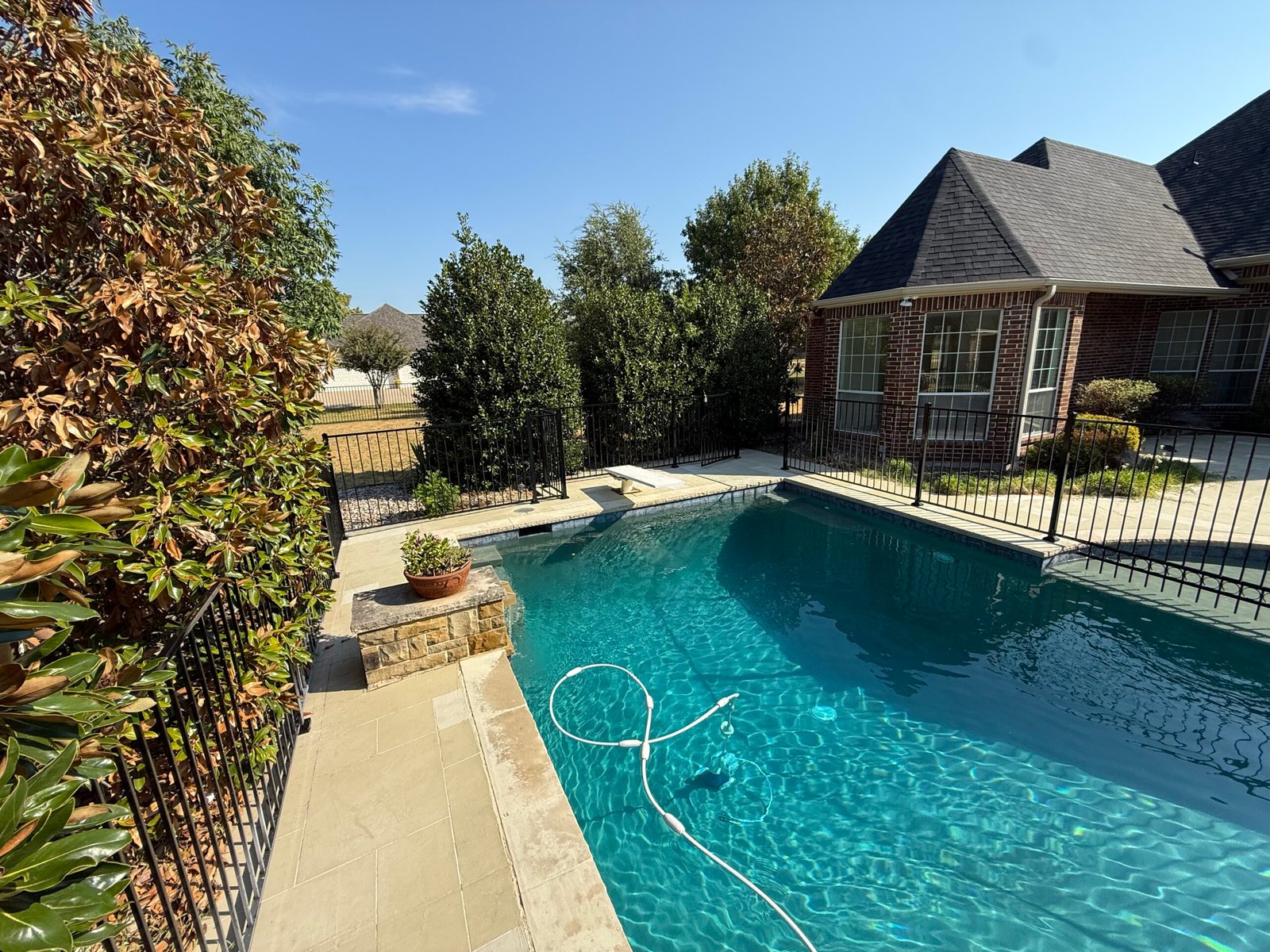 Black powder-coated pool fence installed in Parker Texas