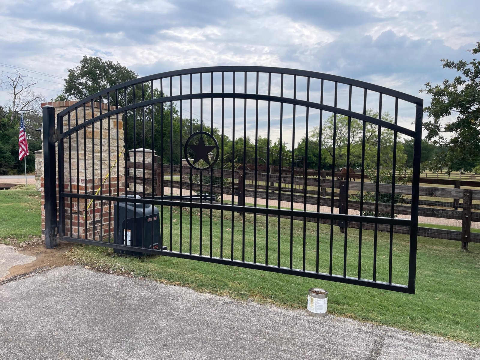 New all-metal automatic driveway gate installed after vehicle-impact damage