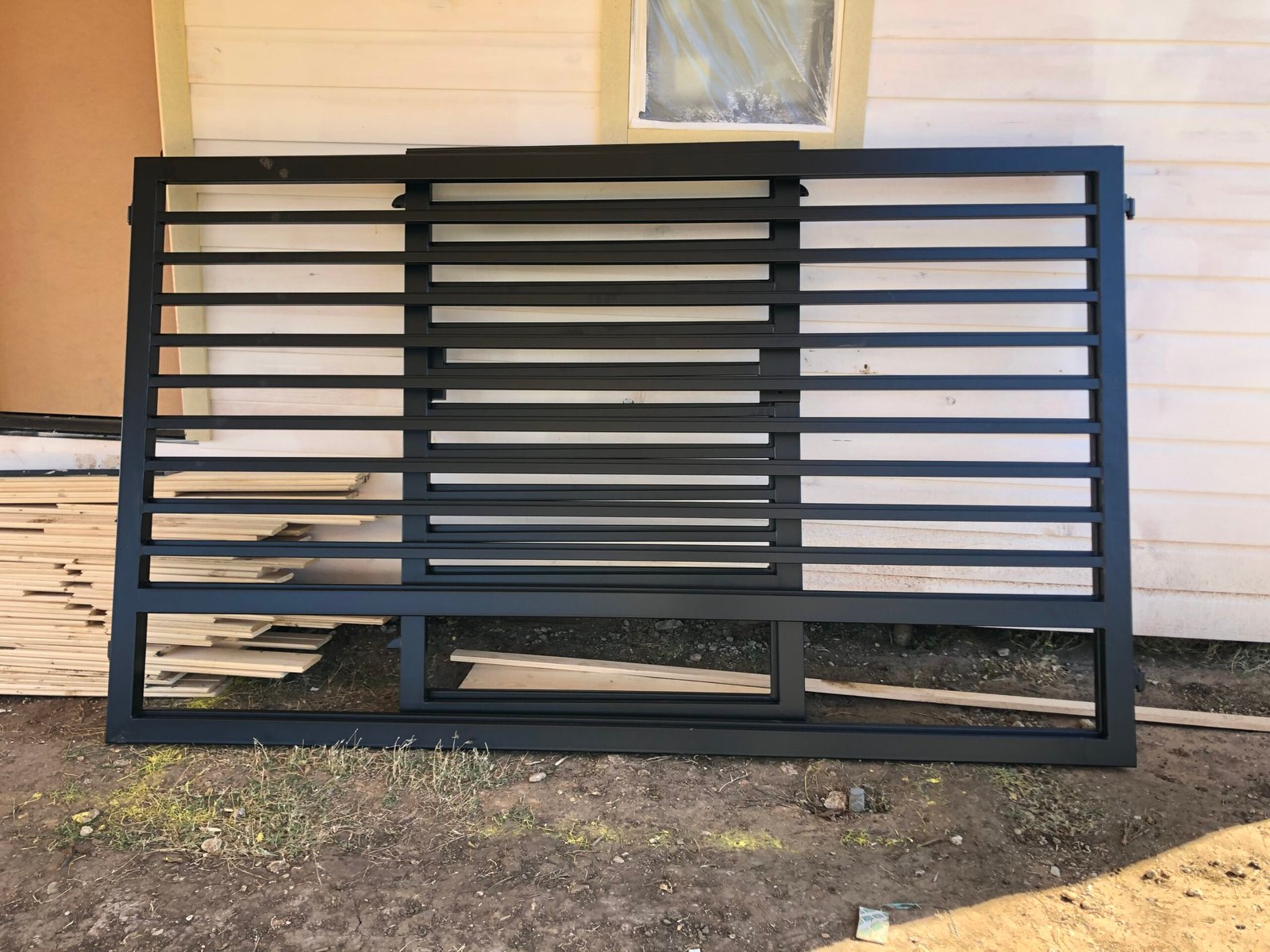 Automatic driveway gate components prepared before concrete work