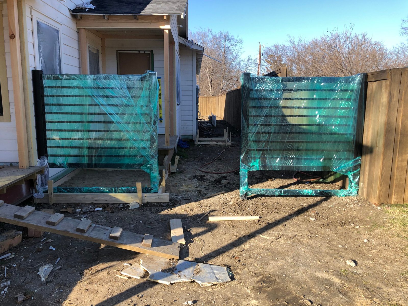 Gate entrance protected while driveway reinforcement was prepared