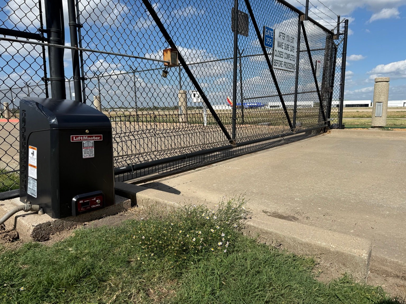 New LiftMaster CSL24UL commercial sliding gate operator installed at Dallas Love Field Airport