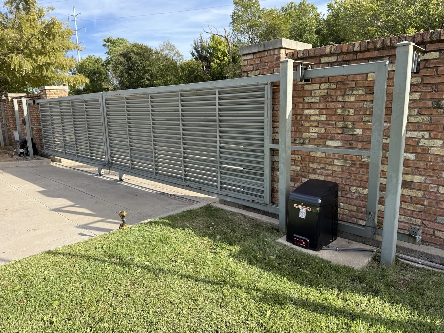 New sliding gate motor installation completed at commercial property in Dallas