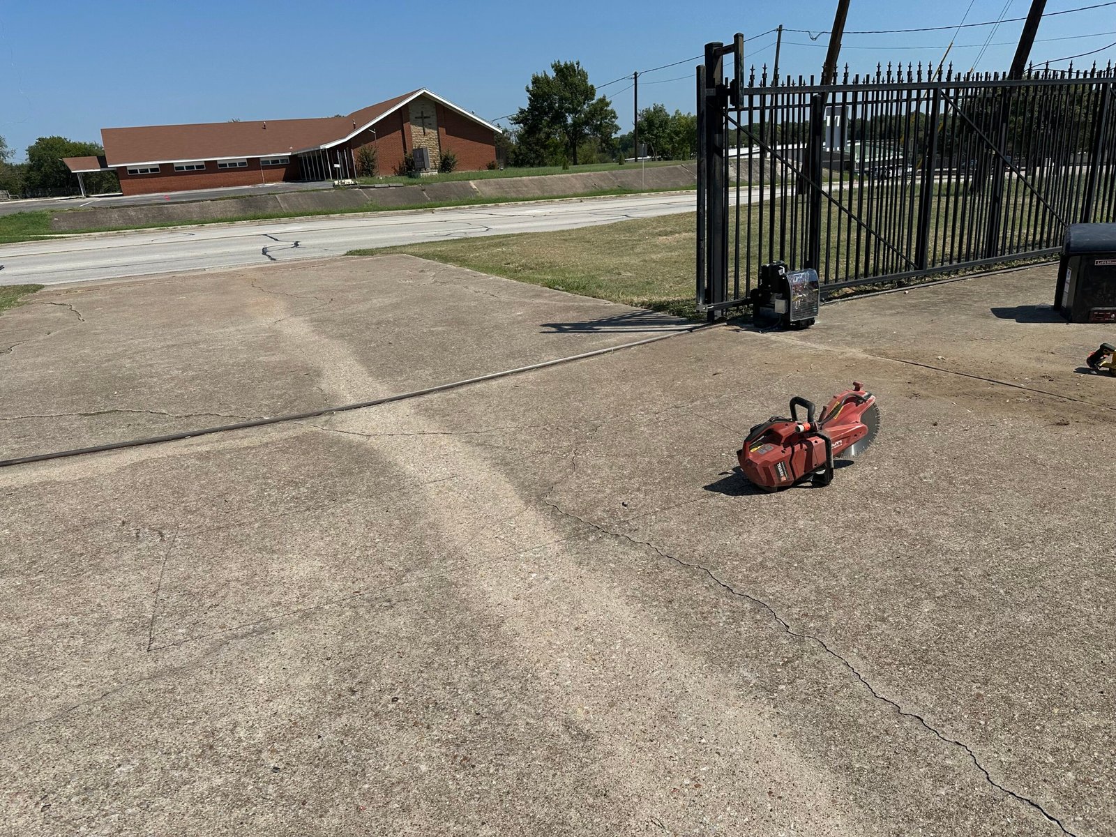 LiftMaster sliding gate operator installed while Exit Loop installation is in progress in Watauga