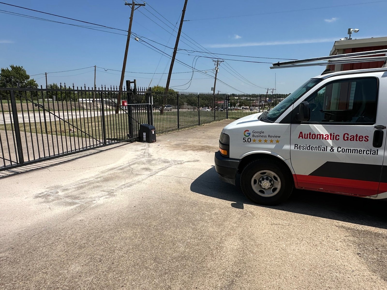 Completed LiftMaster sliding gate operator installation at a storage property entrance in Watauga