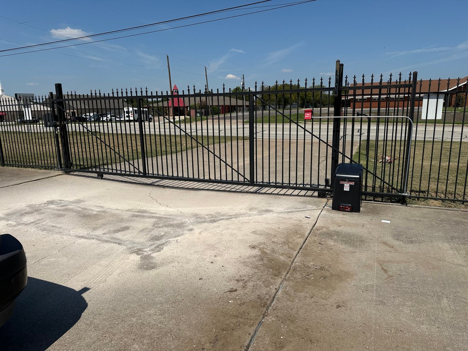 Completed sliding gate operator and Exit Loop installation at a storage property in Watauga